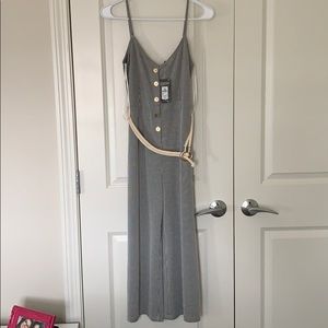 Black & white striped jumpsuit with belt & buttons